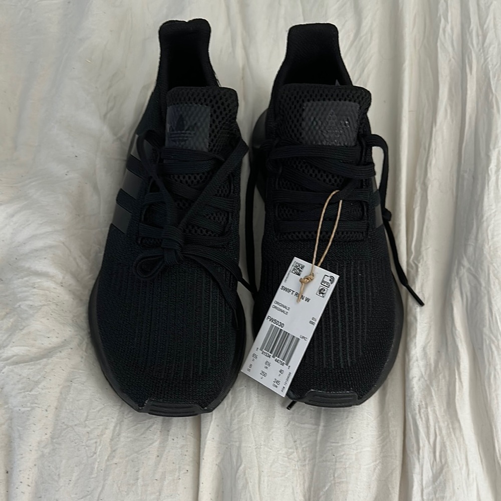 Adidas Black Athletic Shoes with Knit Upper and Sleek Design